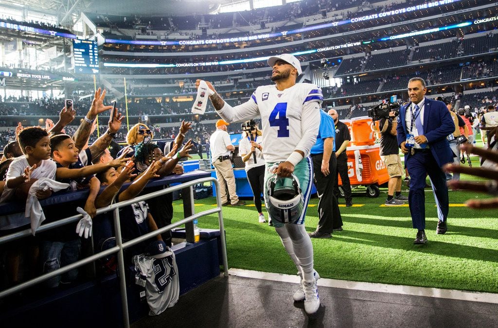 Dallas Cowboys quarterback Dak Prescott (4) leaves the field after a 35-17 win over the New York Giants on Sunday, September 8, 2019 at AT&T Stadium in Arlington.