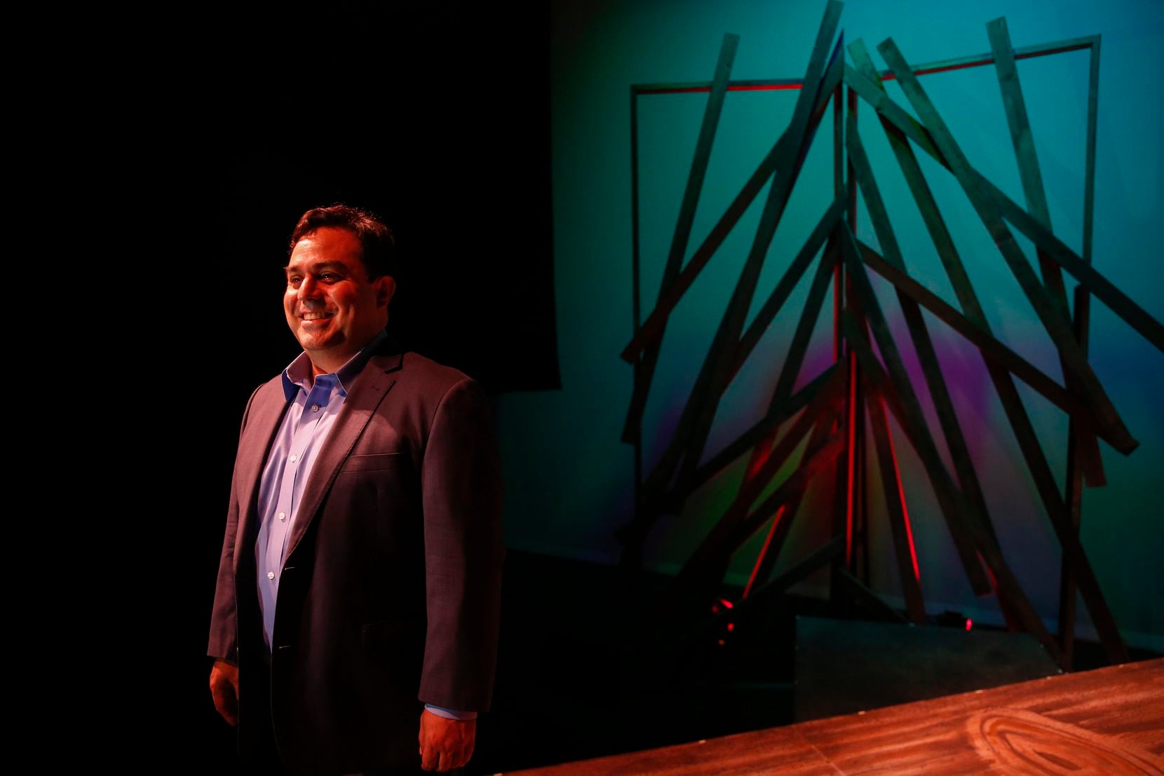David Lozano, the executive artistic director of Cara Mia Theatre, poses for a photograph on Wednesday, Dec. 11, 2019 at the Latino Cultural Center in Dallas. 