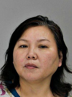 Yong Bei Wang Murphy, known to Dragon House customers as Lucy Murphy, in her mug shot following last week's raids and arrests.