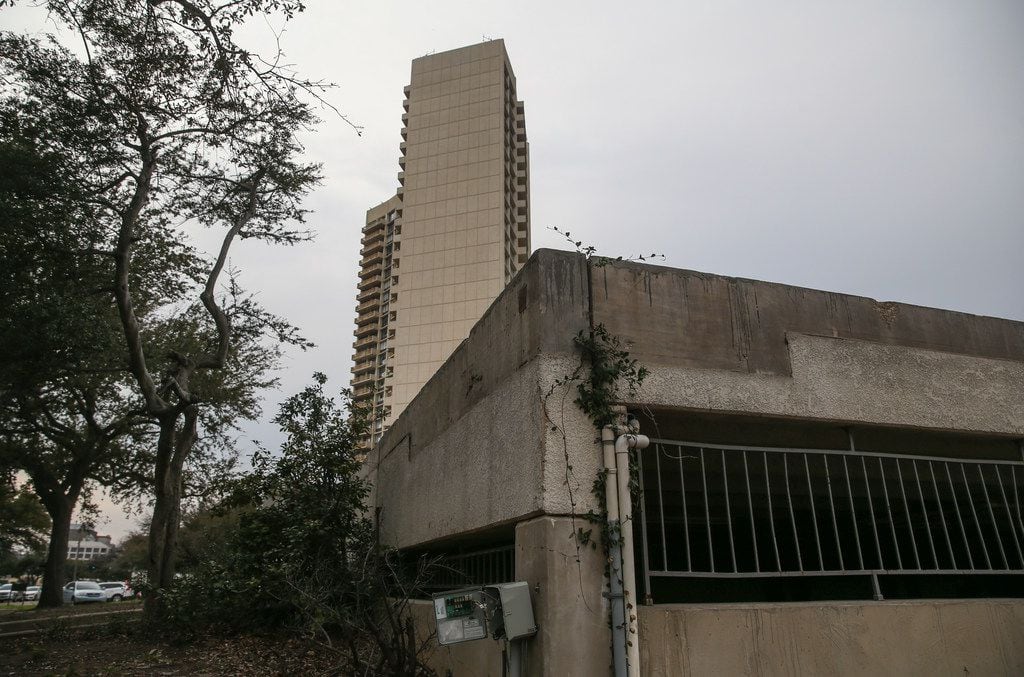 In the shadow of Preston Tower, this burned-out husk of a concrete parking garage is all that remains of the Preston Place condo building that still hasn't been removed or replaced since the fire of March 2017.