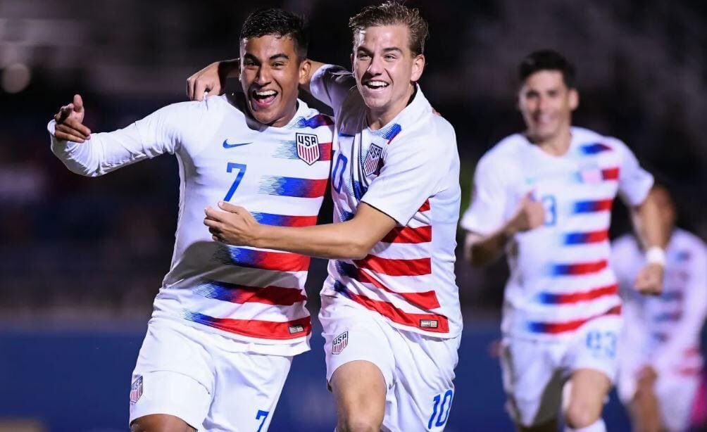 Paxton Pomykal of FC Dallas (#10 center) celebrates during the 2018 Concacaf U20 Championships with Juan Pablo Torres (#7 left)