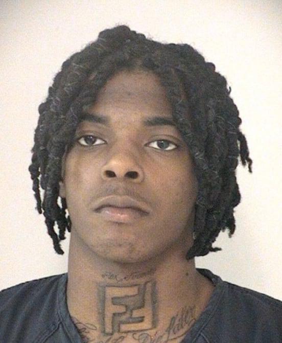 A photo released by the Fort Bend County Sheriff's Office of Tavores Henderson, wanted in connection with the killing of Nassau Bay Police Sgt. Kaila Sullivan, that shows Henderson's distinctive tattoo.
