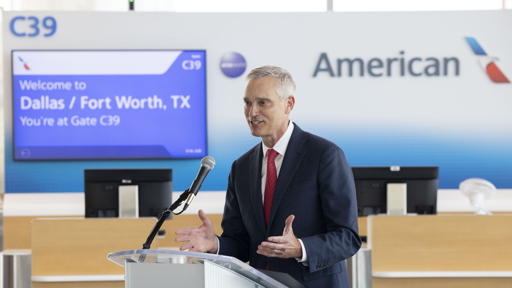 American Airlines CEO Robert Isom speaks during a press conference at Terminal C in DFW...
