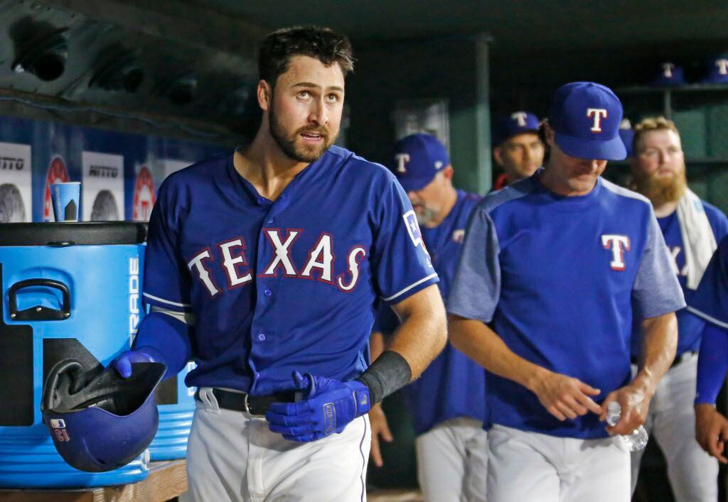 Texas Rangers third baseman Joey Gallo (13) is pictured in the dugout after hitting a home...