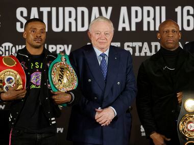 WBC and IBF world champion Errol “The Truth” Spence Jr., left, Dallas Cowboys owner Jerry...