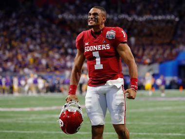ATLANTA, GEORGIA - DECEMBER 28: Quarterback Jalen Hurts #1 of the Oklahoma Sooners reacts from the sidelines during the game against the LSU Tigers in the Chick-fil-A Peach Bowl at Mercedes-Benz Stadium on December 28, 2019 in Atlanta, Georgia.