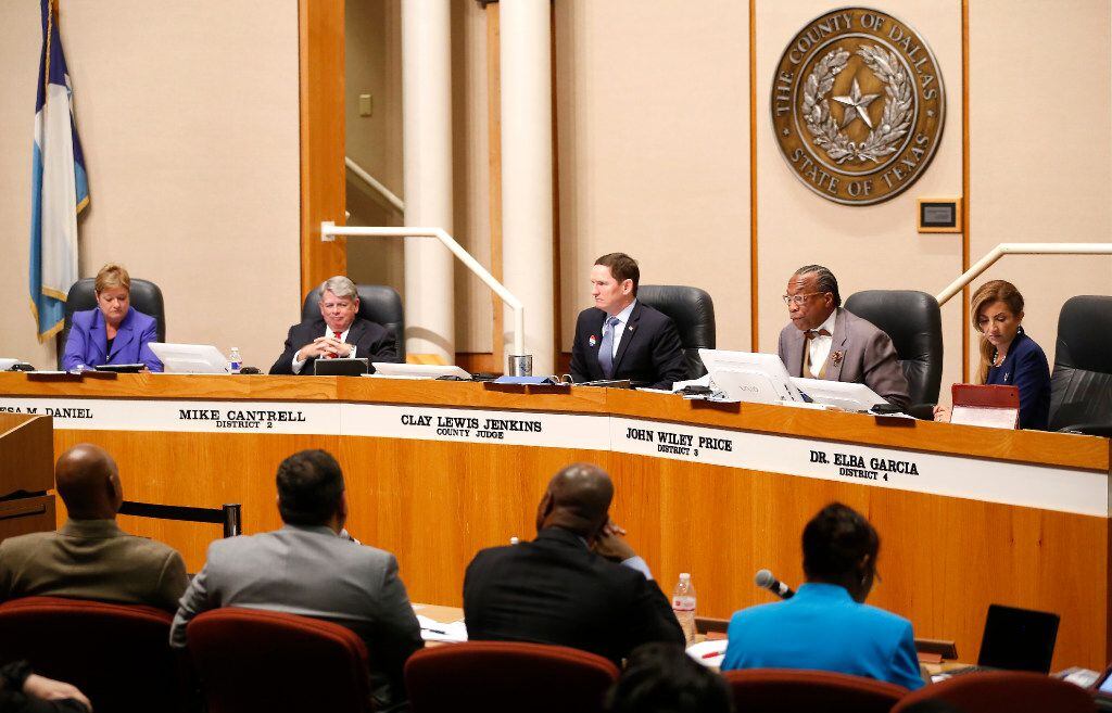 County Judge Clay Jenkins and Commissioner Mike Cantrell sought to cut the county tax rate...