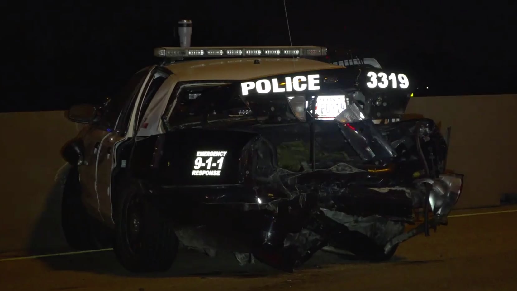 An Edgewood police officer was hospitalized after a Maserati rammed into his squad car where he was working off-duty early Friday.