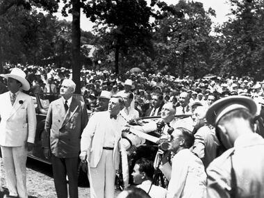 WFAA radio broadcast the ceremony live as President Franklin D. Roosevelt (seated in an...