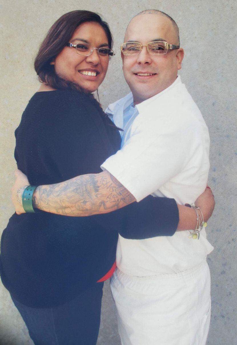 Cassandra Gonzales hugs her husband, Eric Gonzales, in an undated photograph. Cassandra...