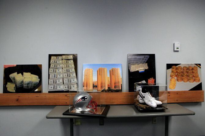 Some of the memorabilia seized during the sports ring bust was displayed at police...