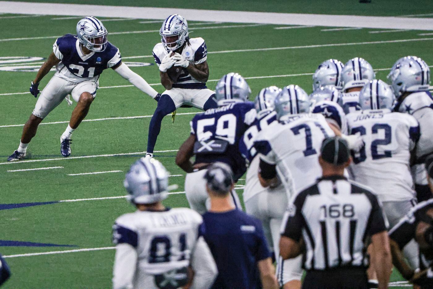 Dallas Cowboys safety Tyler Coyle (31) defends Dallas Cowboys wide receiver KaVontae Turpin...