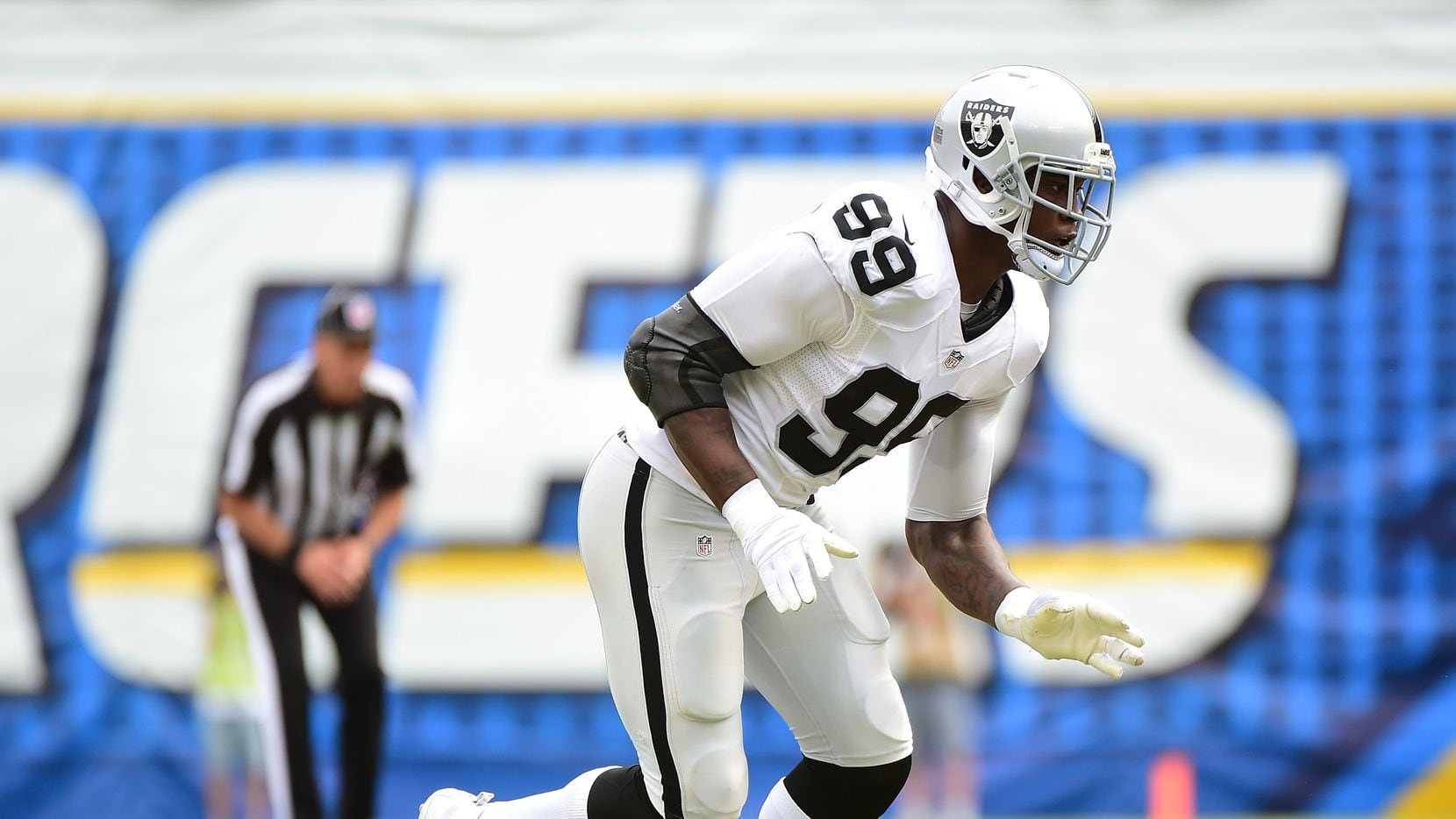 SAN DIEGO, CA - OCTOBER 25:  Aldon Smith #99 of the Oakland Raiders comes off the line during the game against the San Diego Chargers at Qualcomm Stadium on October 25, 2015 in San Diego, California.  (Photo by Harry How/Getty Images)