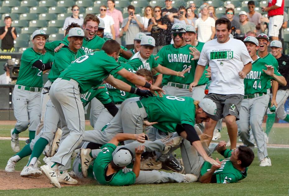 Southlake Carroll players celebrate their 7-2 victory over San Antonio Reagan to capture the...
