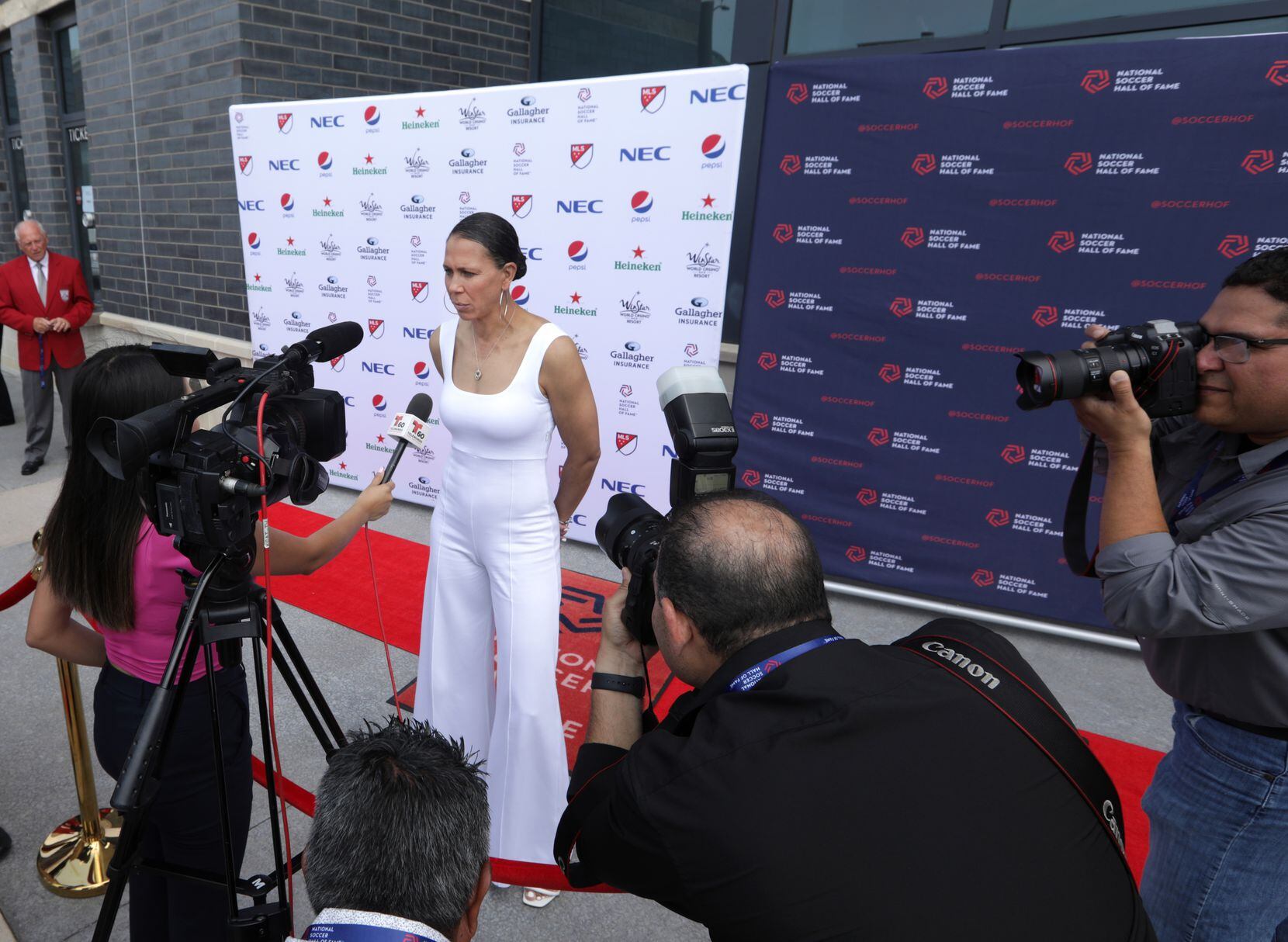 Shannon Boxx does an interview on the red carpet during the National Soccer Hall of Fame...