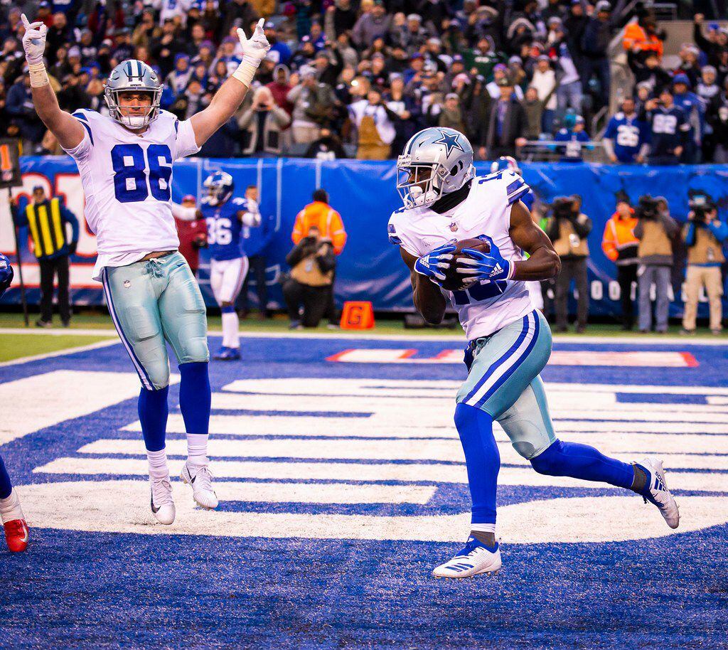 Dallas Cowboys wide receiver Michael Gallup (13) celebrates with tight end Dalton Schultz (86) after catching a 2-point conversion during the fourth quarter of of an NFL football game against the New York Giants at MetLife Stadium on Sunday, Dec. 30, 2018, in East Rutherford, New Jersey. The conversion game the Cowboys the win, 36-35.  (Smiley N. Pool/The Dallas Morning News)