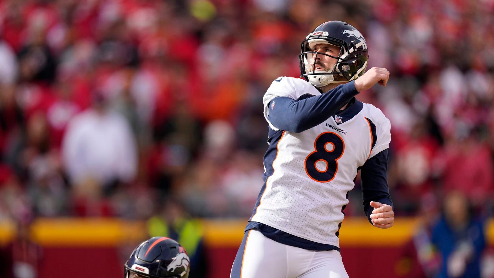 Denver Broncos place kicker Brandon McManus watches his 49-yard field goal during the first...