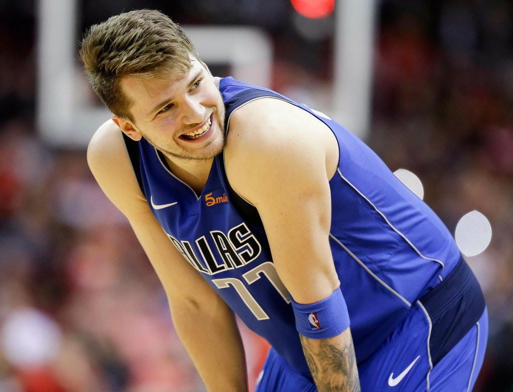 Dallas Mavericks forward Luka Doncic reacts after being called for a foul late in the second...