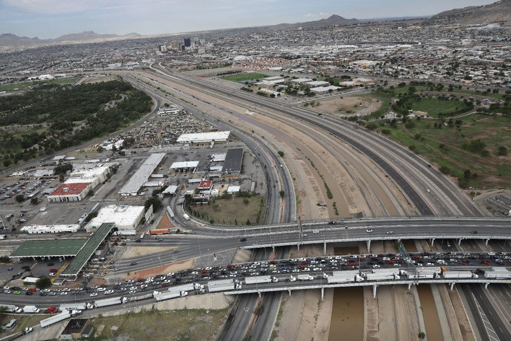 EL PASO, TX - AUGUST 01:  An international bridge crosses the Rio Grande which forms the...