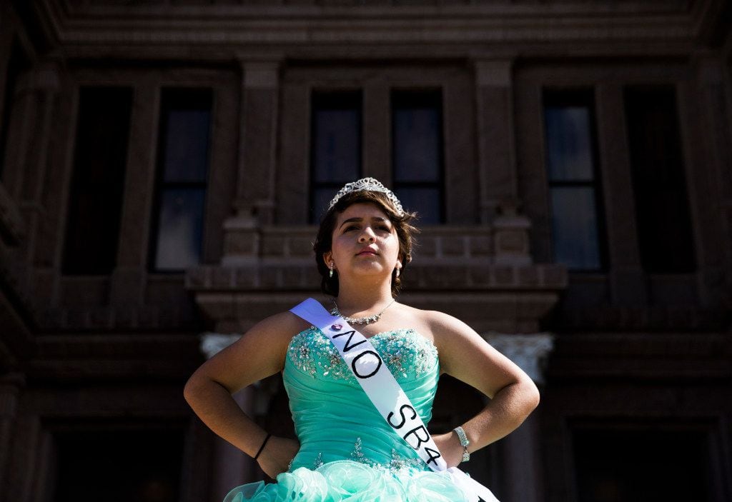Jennifer Ramirez, 16, wears a "No SB4" sash as she and other teenage girls with Jolt Texas...