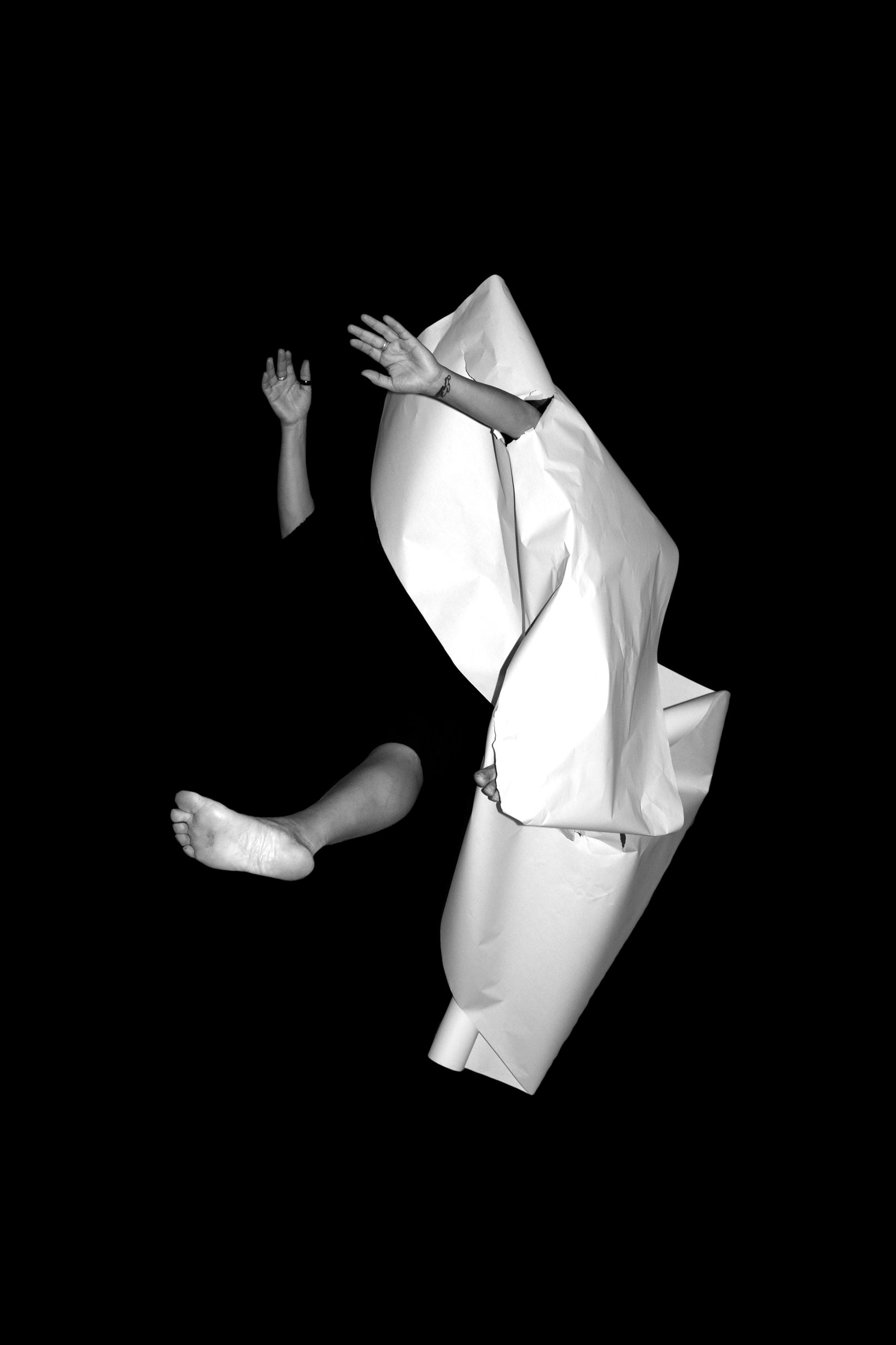 Dancer-choreographer Jimena Bermejo performs in a paper sculpture in "Paper Piel," her...
