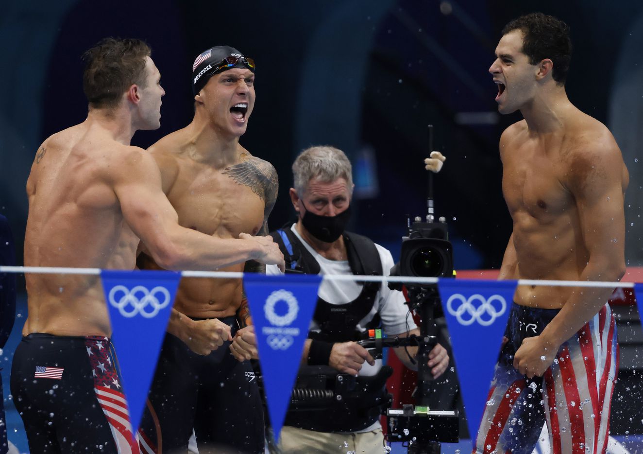 USA’s Ryan Murphy, Caeleb Dressel and Michael Andrew celebrate after Zach Apple finished the...
