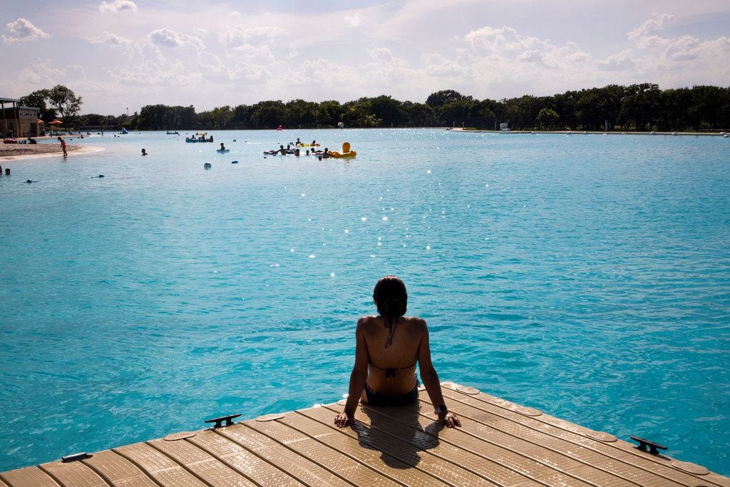 Thirteen-year-old Sachiko Steinhilper sits on one of the docks at the Crystal Lagoon at...