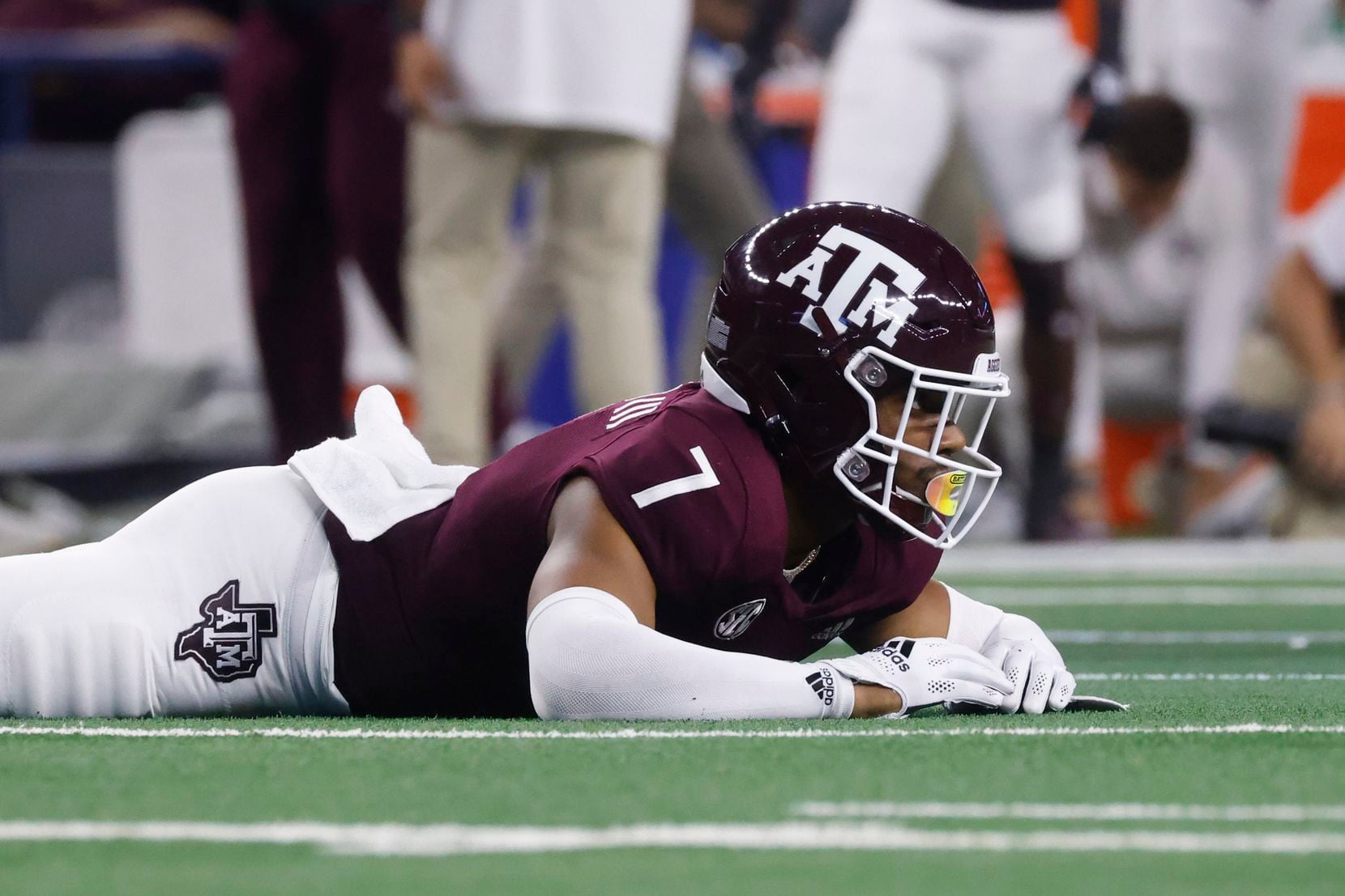 Texas A&M wide receiver Moose Muhammad III reacts after he misses to receive a pass against...