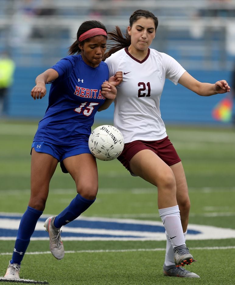 Midlothian Heritage's Rachel Allen (15) goes up against Calallen's Ivanna Alvarez (21) during their UIL 4A girls State championship soccer game at Birkelbach Field on April 16, 2021 in Georgetown, Texas.  (Thao Nguyen/Special Contributor)