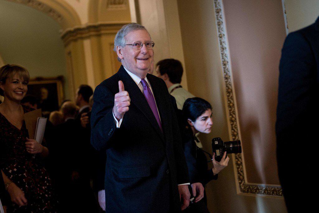 Senate Majority Leader Mitch McConnell, R-Ky., walks from Capitol Hill after the Senate...