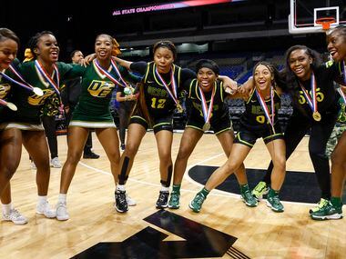The DeSoto team celebrates after winning the Class 6A state championship at the Alamodome on...