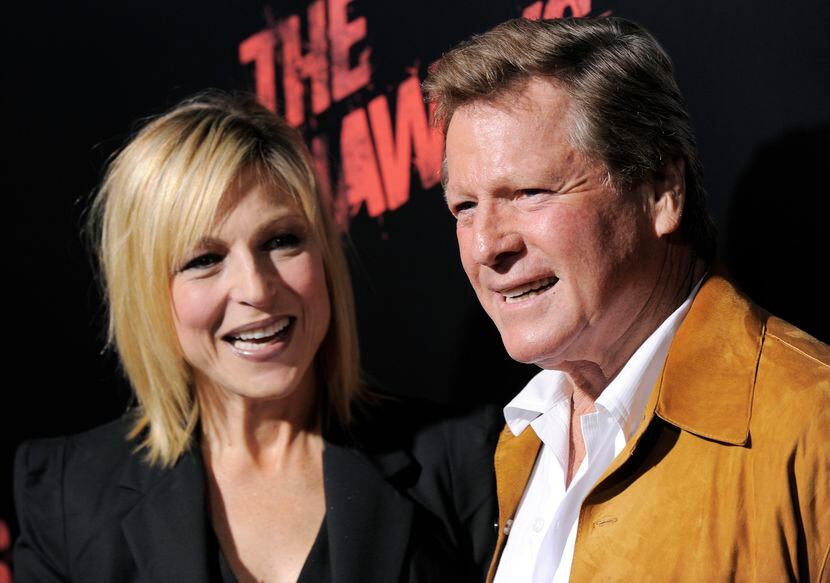 FILE - Tatum O'Neal, left, a cast member in "The Runaways," and her father, actor Ryan...