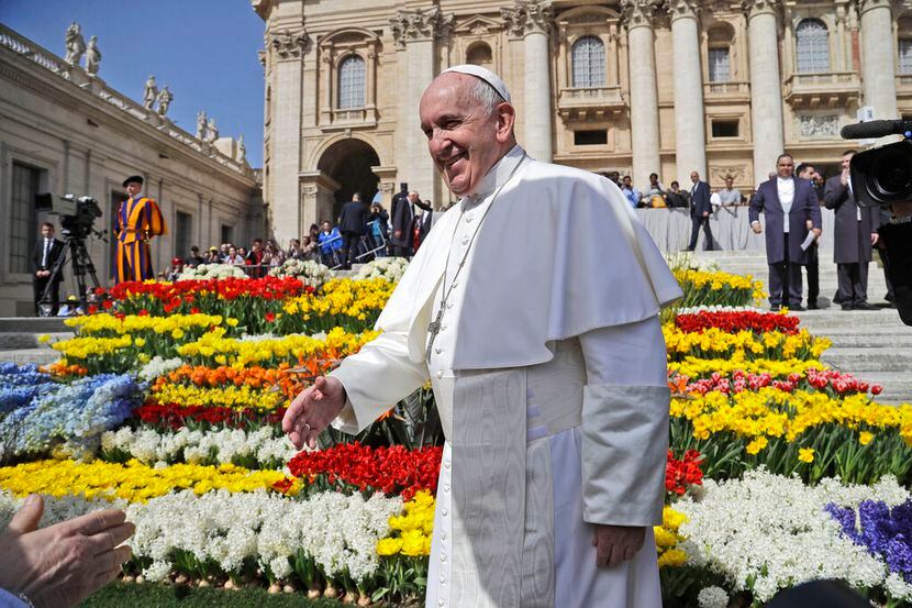 Pope Francis arrives for his weekly general audience in St. Peter’s square at the Vatican,...