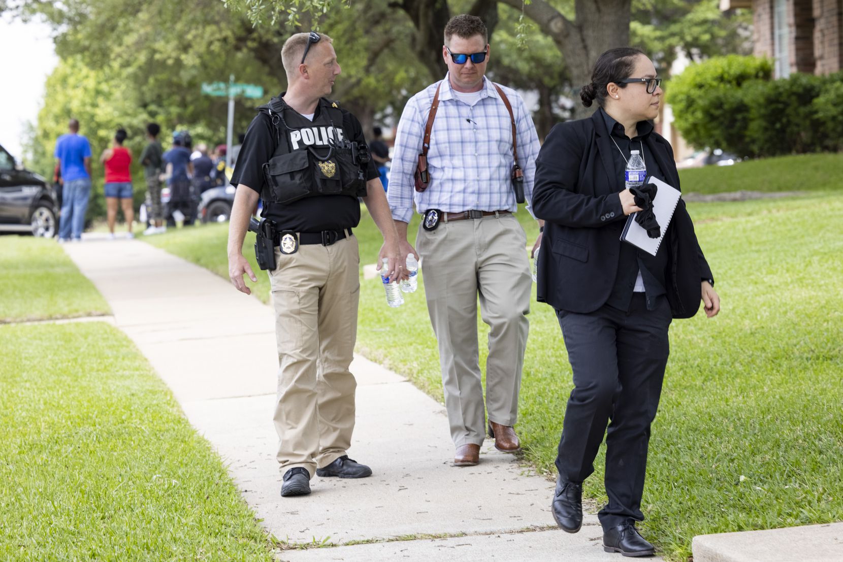 Officers with the Dallas Police Department's special victims unit went door to door in search of any helpful video footage or information.