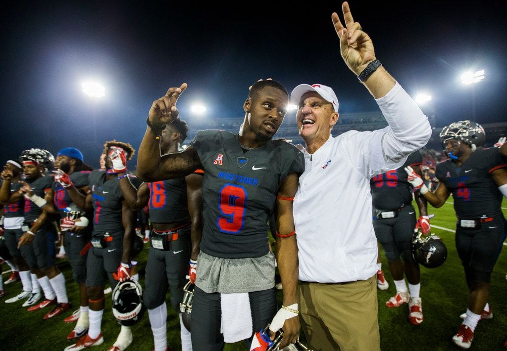 Southern Methodist Mustangs wide receiver Shelby Walker (9) has his head rubbed by head coach Chad Morris after a 44-21 win over the Arkansas State Red Wolves on Saturday, September 23, 2017 at Ford Stadium on the SMU campus in Dallas. (Ashley Landis/The Dallas Morning News) 
