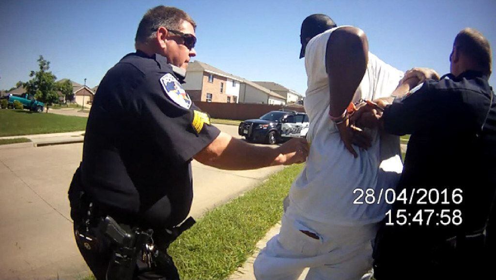 This image from a body camera video of a Balch Springs officer shows Sgt. James Young using...