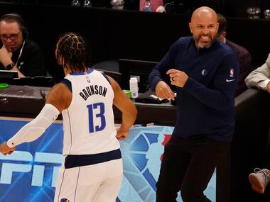 Dallas Mavericks head coach Jason Kidd and Dallas Mavericks guard Jalen Brunson (13)...