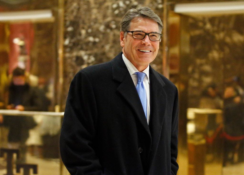 FILE - In this Dec. 12, 2016 file photo, former Texas Gov. Rick Perry smiles as he leaves...