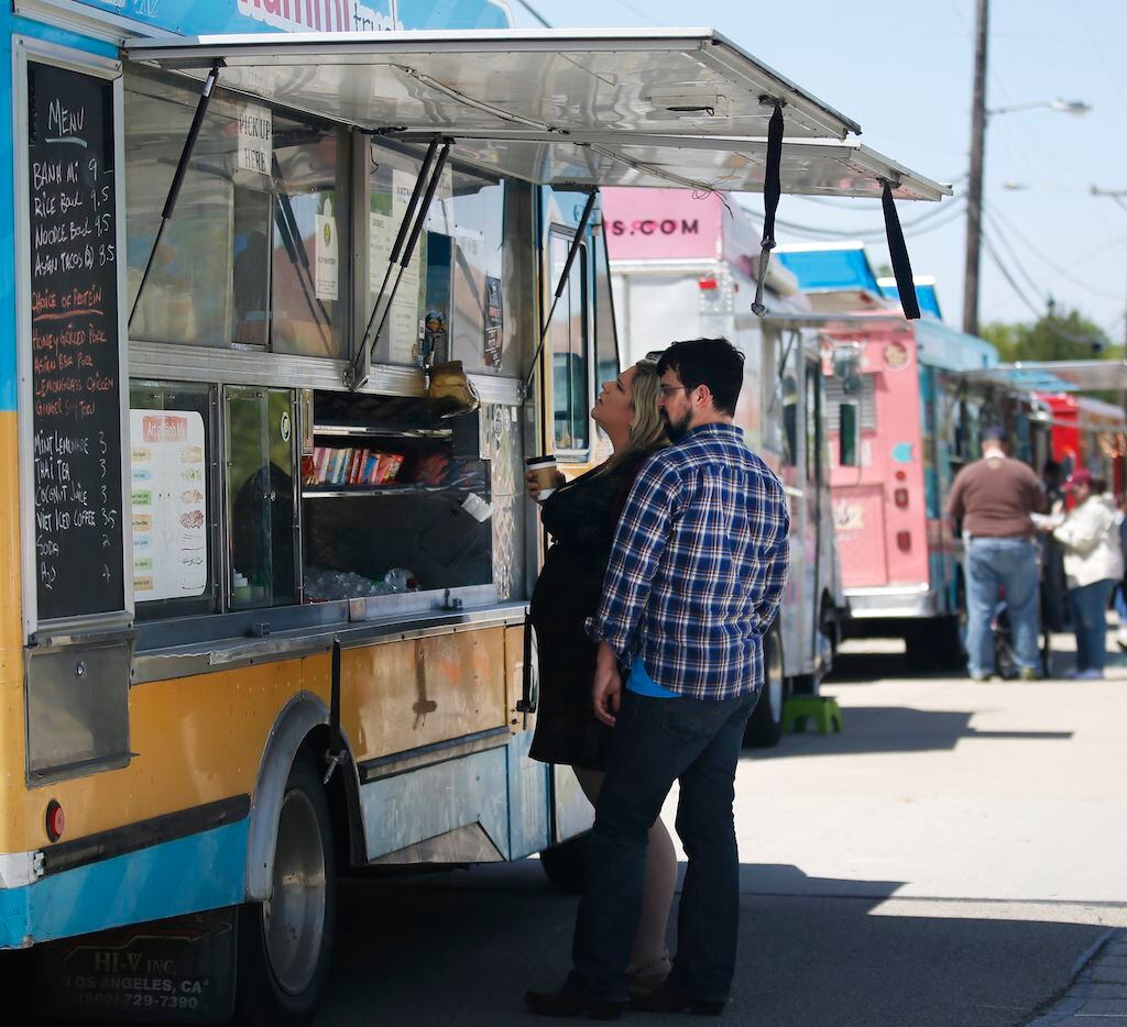 Food trucks are lined up during the Frisco StrEATS Gourmet Food, Truck and Music Festival on...