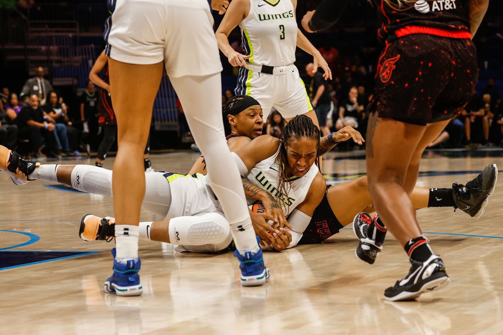 Dallas Wings forward Kayla Thornton (6) and Indiana Fever Emma Cannon (32) fight for the...