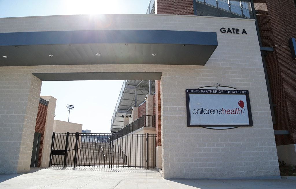 A Children's Health sign is visible from the parking lot at Children's Health Stadium in...