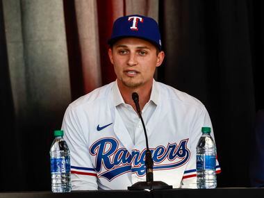 Corey Seager speaks at a news conference at Globe Life Park in Arlington on Wednesday, Dec....