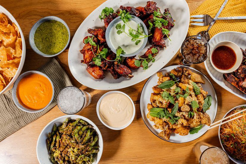 LORO's Super Bowl package includes smoked wings, sesame rice noodles, oak grilled edamame,...