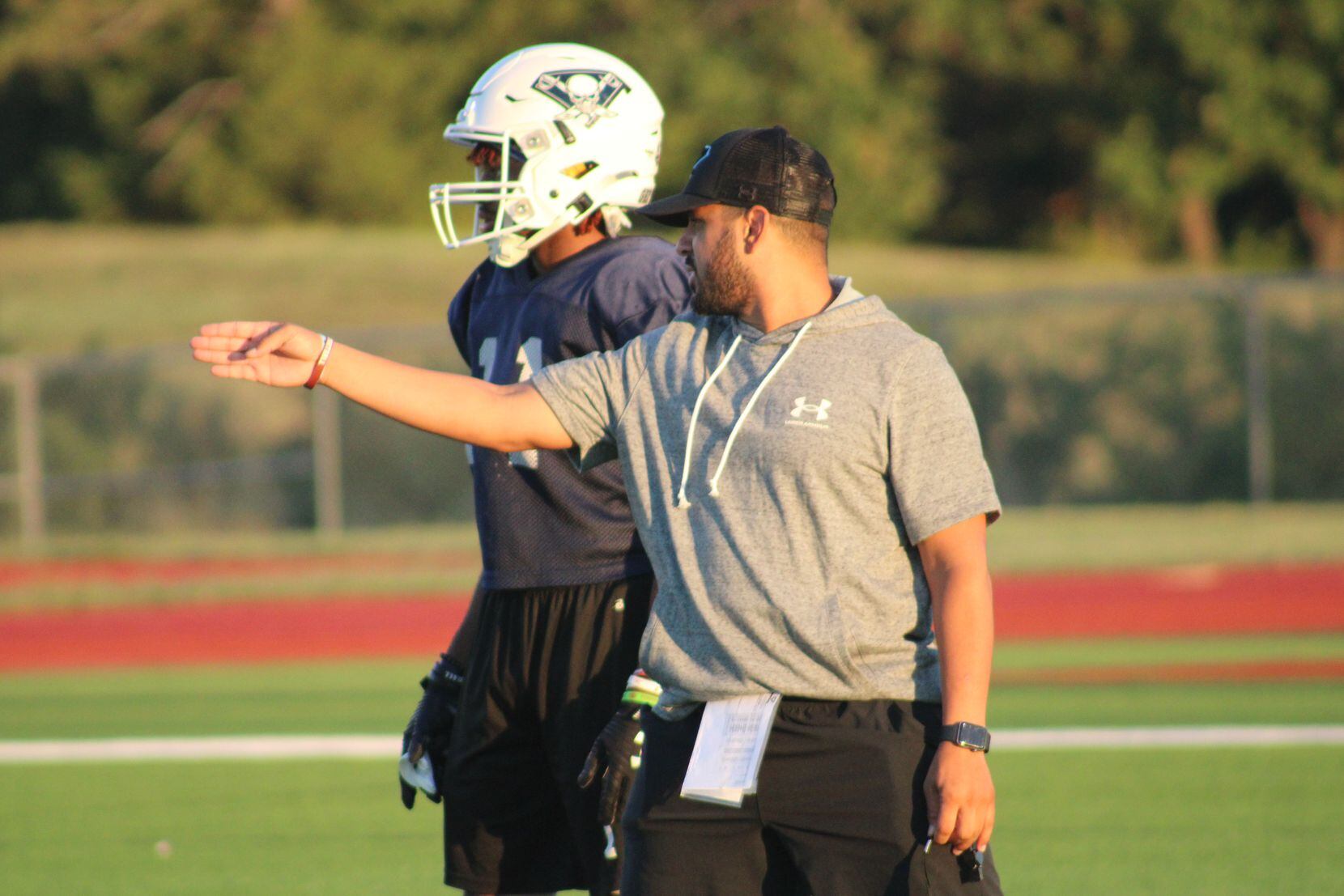 Wylie East coach Marcus Gold, in his second season with the team, directs a player at...