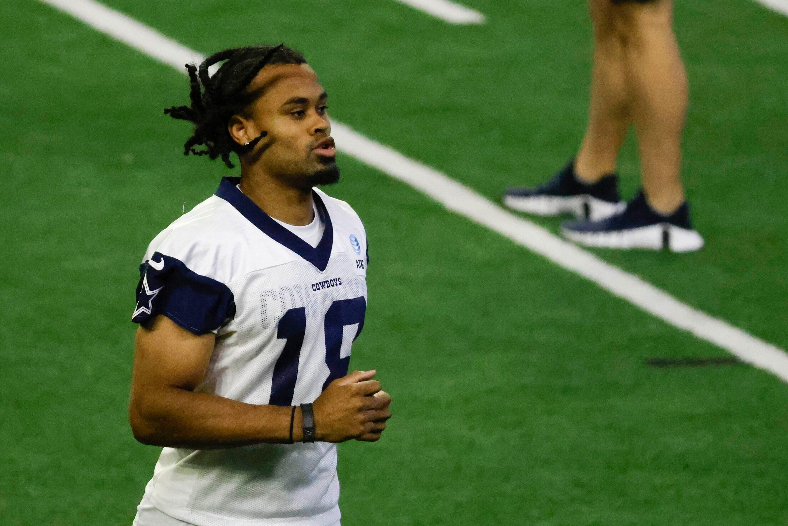 Dallas Cowboys wide receiver Jalen Tolbert exits the field during a mini camp session at The...