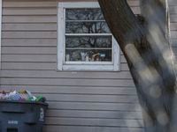 A bullet hole is seen below a window in the home where Crystal Rodriguez, 18, was fatally shot early Tuesday.
