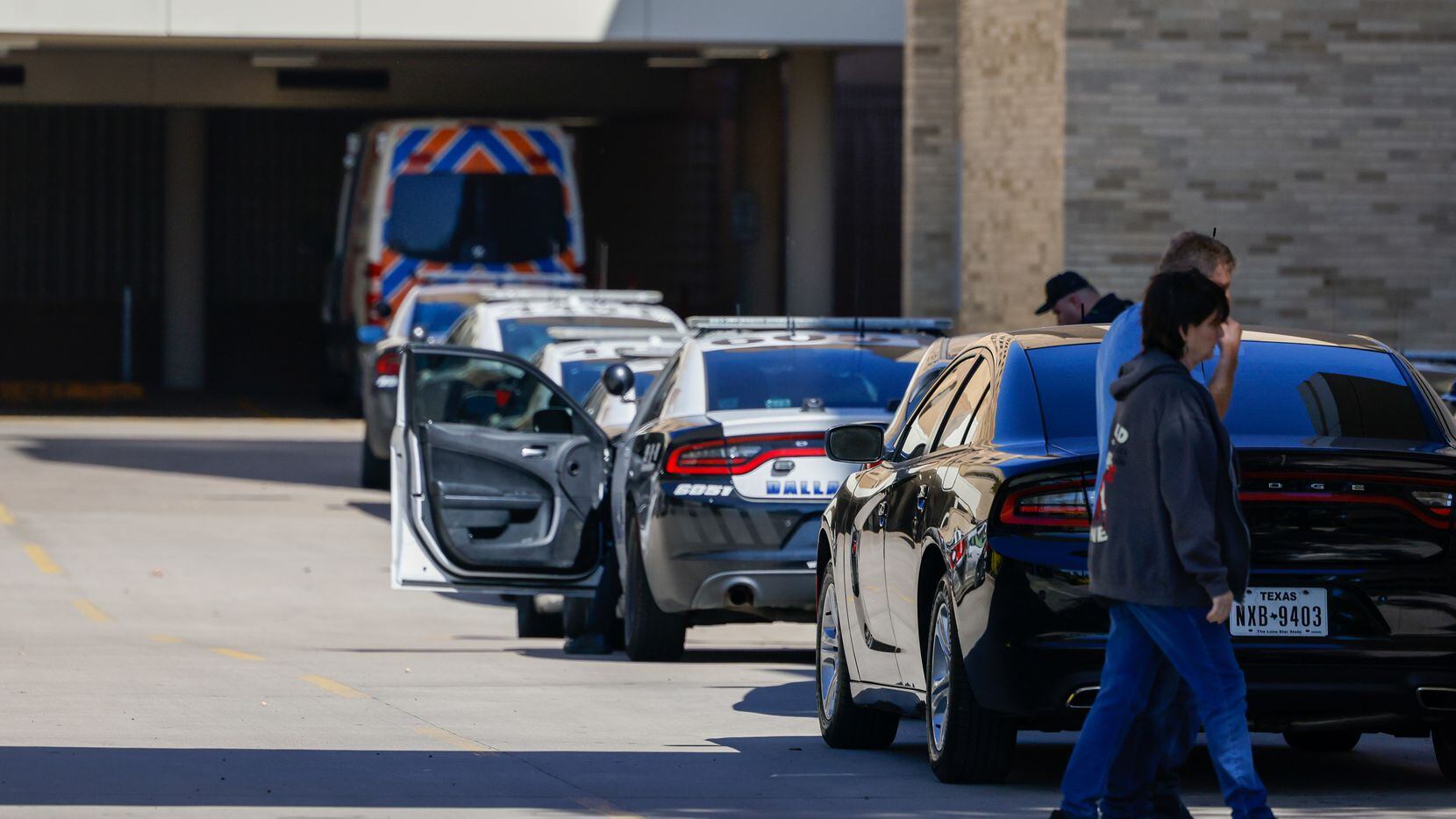 Police said a suspect is in custody after two people were shot at Methodist Dallas Medical...