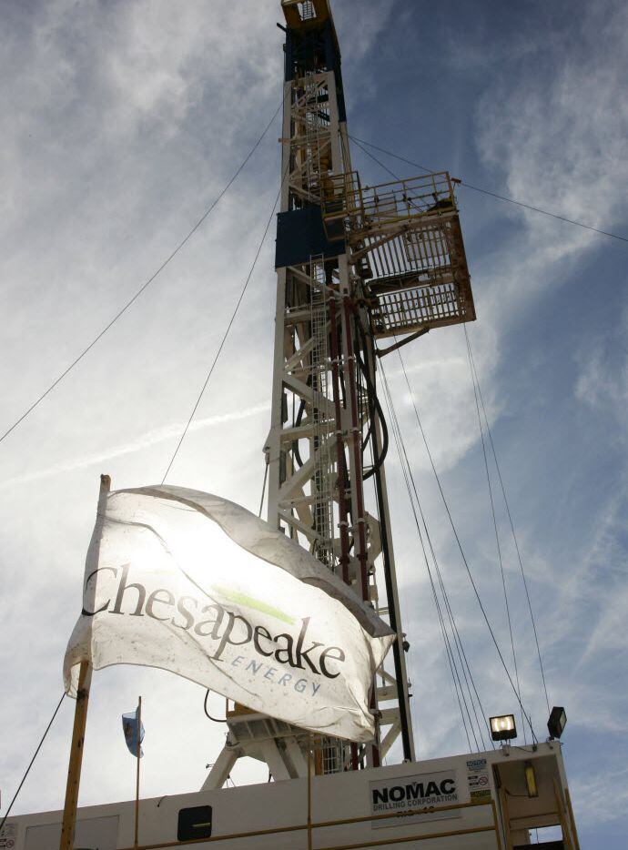 A Chesapeake drilling rig near Bessie, Okla. (AP Photo/Sue Ogrocki, File)