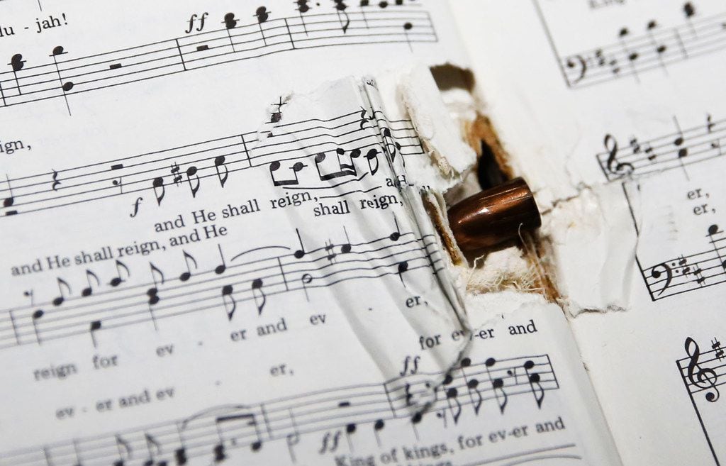 A bullet lodged in the spine of a hymnal was among items in a special display on the...