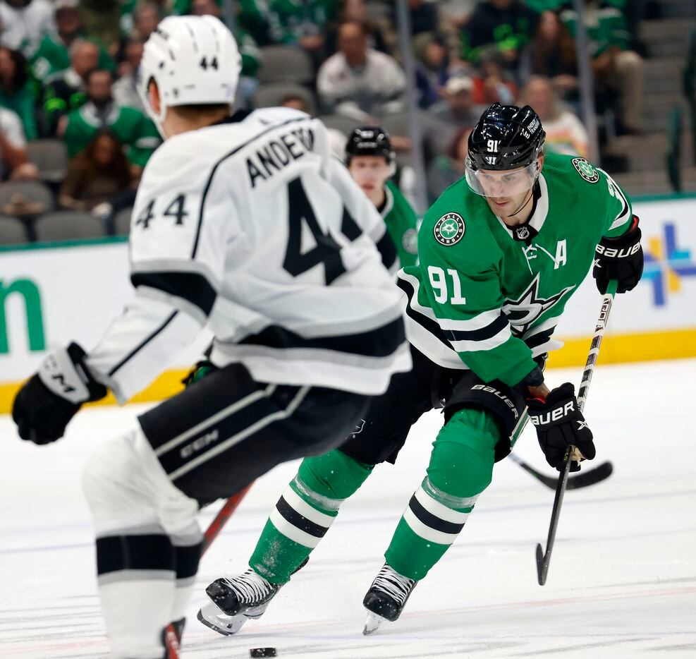 Dallas Stars center Tyler Seguin (91) takes a pass and skates by Los Angeles Kings...